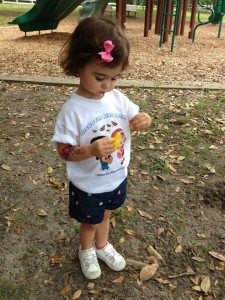 This is Eva and Eva has Microtia and Atresia.  Eva enjoyed Ear Community's Florida picnic while wearing her "Microtia Kids Rock" T-shirt and having fun blowing bubbles on Saturday, April 27th, 2013 in Orlando.