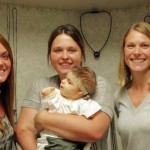 Dr. Tricia Nechodom (left), with Sarah and her son, Regan (center), and Dr. Jerrica Maxson (right)