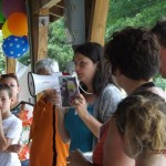 Melissa Tumblin speaking with families about all options at the 2013 Cincinnati, Ohio Ear Community picnic.