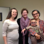 Dustin's fitting:  (left to right) Dr. Katie Zawistowski of Children's Hospital Colorado, Wendy Fuller of Cochlear Americas, and Dustin with his happy mom, Jaalah Neerhof.