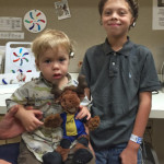 Damian and Michael Mosley, both born with Microtia and Atresia, receiving their newly donated Cochlear Americas Baha 5 processors (August 13, 2015)