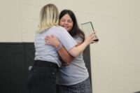 Melissa Tumblin recognizing Ear Community Board Member, Rachel Bernhard, for her outstanding advocacy in the microtia and atresia community with Vanderbilt