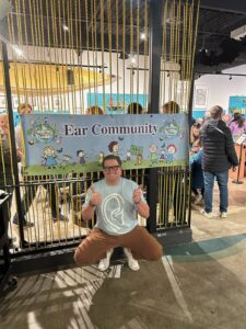 Alex Lang, hosting a fundraiser for Ear Community